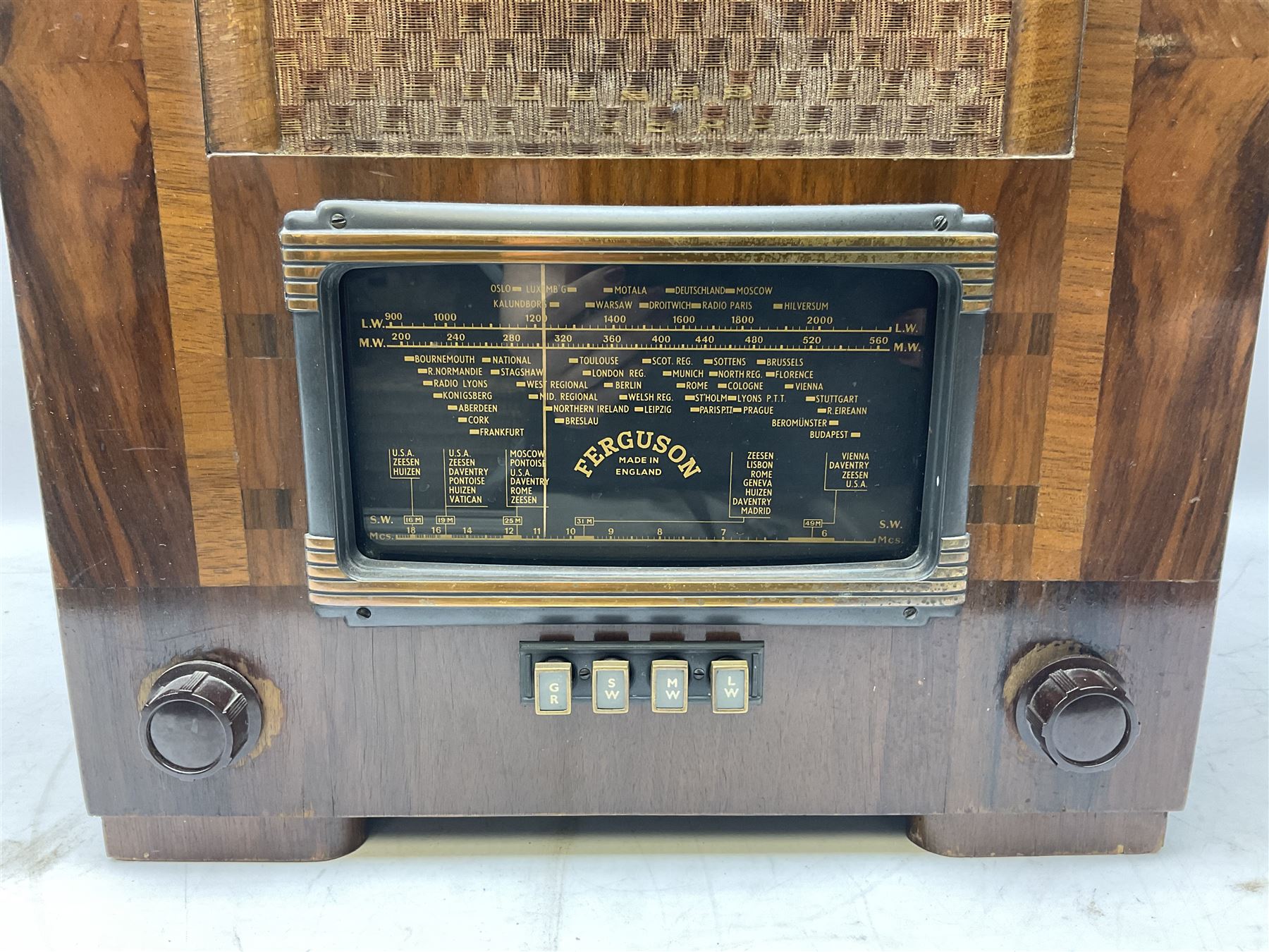 1930s Marconi model 296 valve radio, with Bakelite knobs and trim and 'M' over speaker fret, H40cm W46cm D27cm, together with 1930s Ferguson 702 valve radio with Bakelite knobs, H47cm