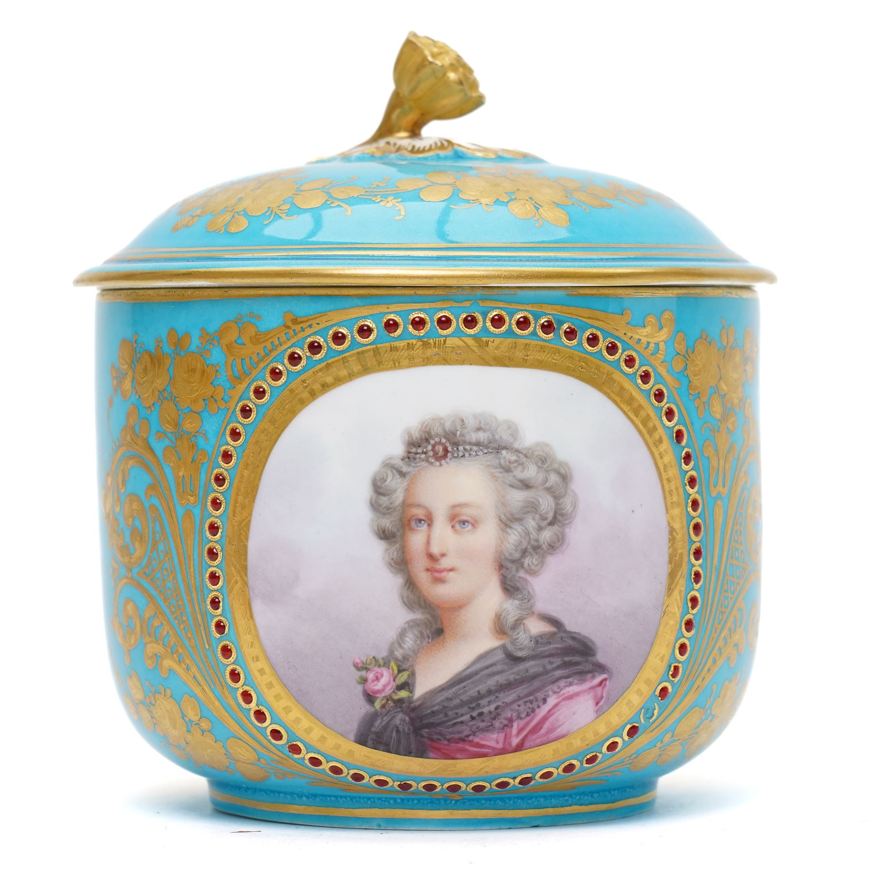 Sevres dejeuner 'Bleu turquoise' tea service for six covers, decorated by Charles-Eloi Asselin, comprising six teacups and saucers, teapot, milk jug and covered sucrier, the bleu de ciel ground painted with portraits of the French courtiers, each piece with name to base (some rubbed) of those depicted, to include Marie Antoinette (teapot), Madame de Montesson, Madame du Barry, Madam de Genlis, Madame Elizabeth (sucrier), Madame de Lamballe (milk jug) Madame Victoire, and two others unidentified, within finely painted gilt surround, each portrait encircled by red jewelled borders, the saucers with corresponding monograms within similar floral gilt and jewelled borders, Sevres mark to base with painted 'ee', dating these 1782, teapot H14cm 