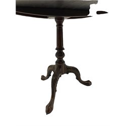 Chippendale design mahogany tilt top occasional table, with reeded column and leaf carved triple splay supports with ball and claw feet