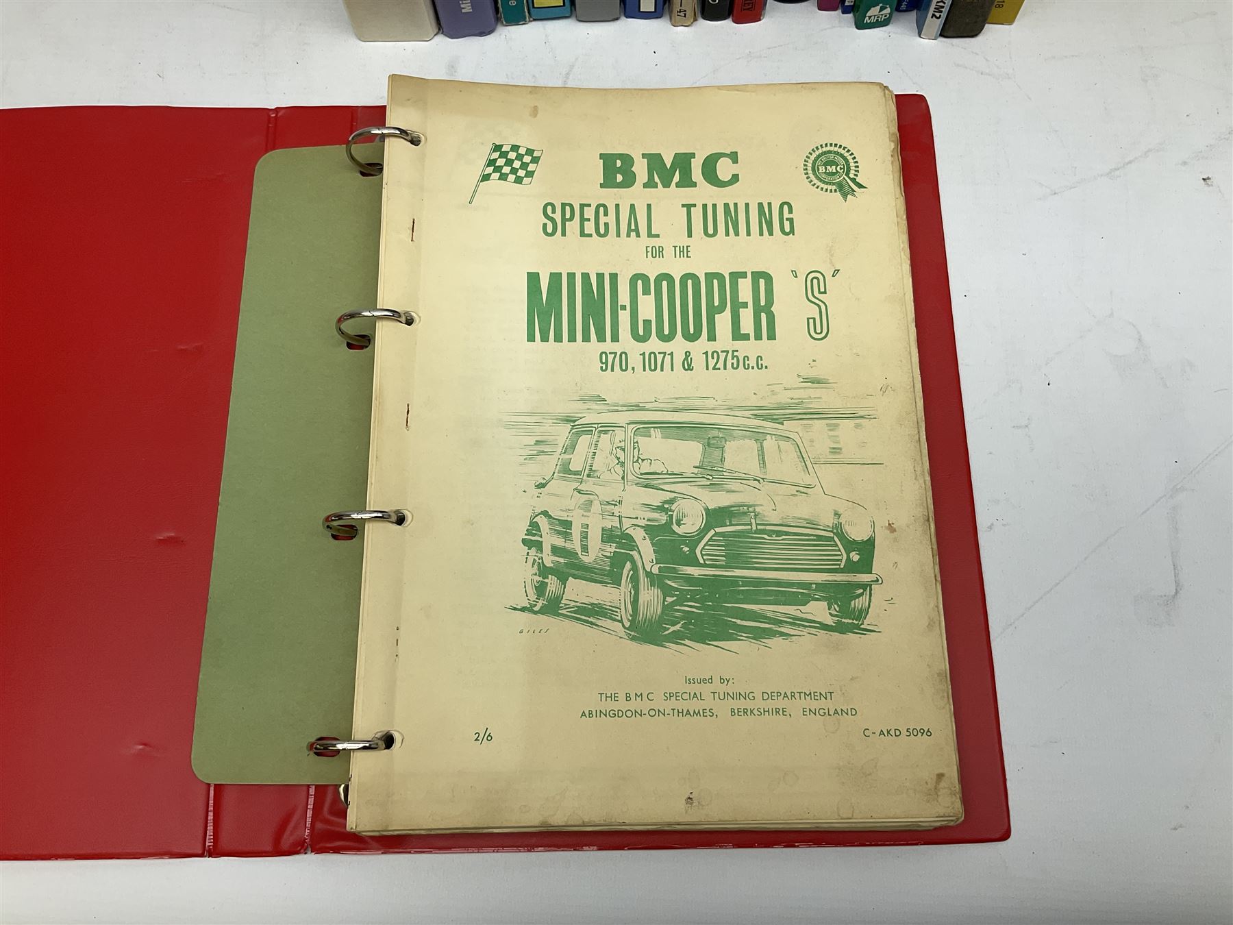 Automobilia - collection of books and ephemera on Mini Cars including BMC Special Tuning Folder for Mini-Cooper 'S', 1972 Handbook, Austin and Morris Mini Cars by Sydney Page 1962, Haynes Manuals, Mechanical Parts Catalogue 1998, thirty and forty years commemorative books, Austin Rover Service and Parts Correspondence Course 1977, video tape and DVD etc (27)