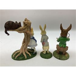 Goebel Alice in Wonderland figures, comprising Alice and Cat, White Rabbit, Queen of Hearts, March Hare, Tweedle Dee and the Mock Turtle, largest H18cm