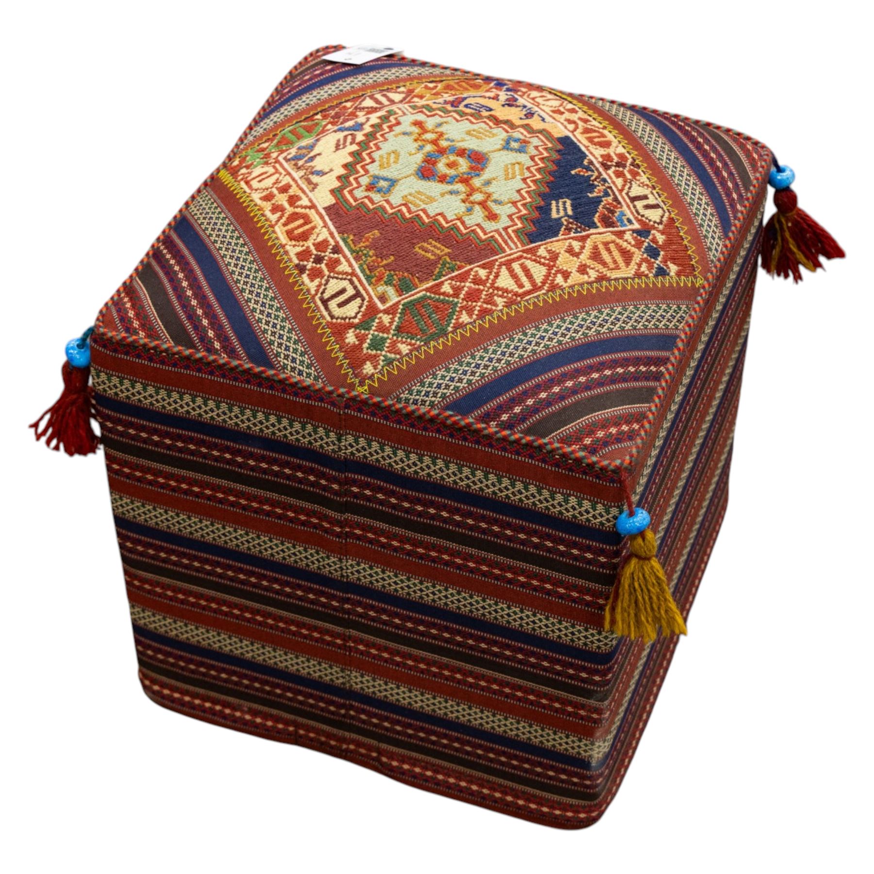 South West Persian Qashqai stool, square flatwoven top with central geometric medallion enclosed within a stepped border the sides decorated with striped bands of geometric motifs with tasselled corners 