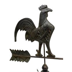 Copper weather vane in the form of a rooster, on two graduating spherical mounts, turned oak footed base 