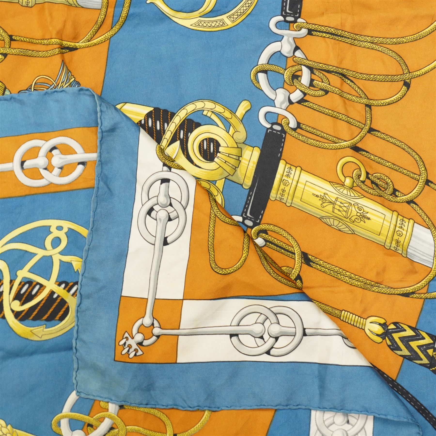Hermes 'Cliquetis' silk scarf in orange and blue colourway, designed by Julie Abadie, 89cm x 89cm