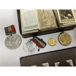 Quantity of cigarette cards and silks, some housed in albums, together with commemorative medallions etc