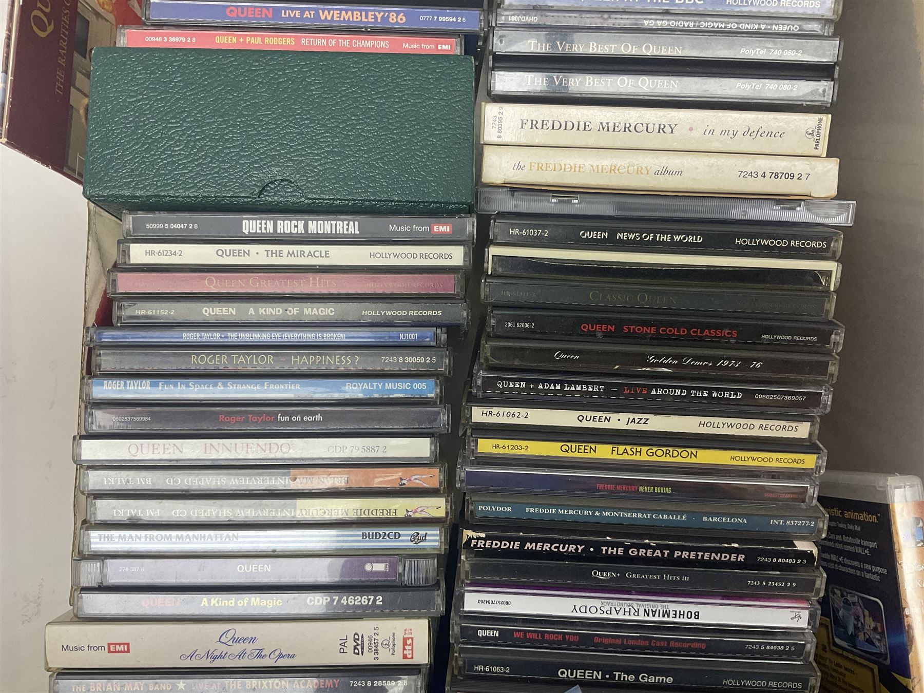 Large collection of VHS tapes, DVDS, CDs to include Queen, James Bond 007, Batman etc, in three boxes