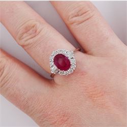 18ct white gold oval cut ruby and round brilliant cut diamond cluster ring, ruby approx 1.25 carat, total diamond weight approx 0.50 carat