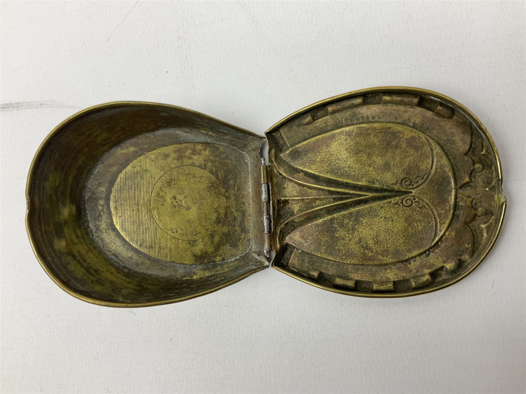 W Avery & Son brass oval pincushion in the form of a hedgehog, and horseshoe needle packet box both inscribed to base 'W. Avery and Son, Redditch', with registration mark, pin cushion L9cm 