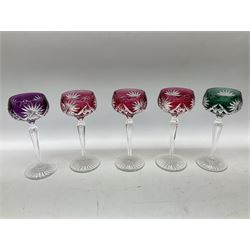 Set of ten coloured hock glasses, with faceted stems and a set of four similar hock glasses, H20cm (14)