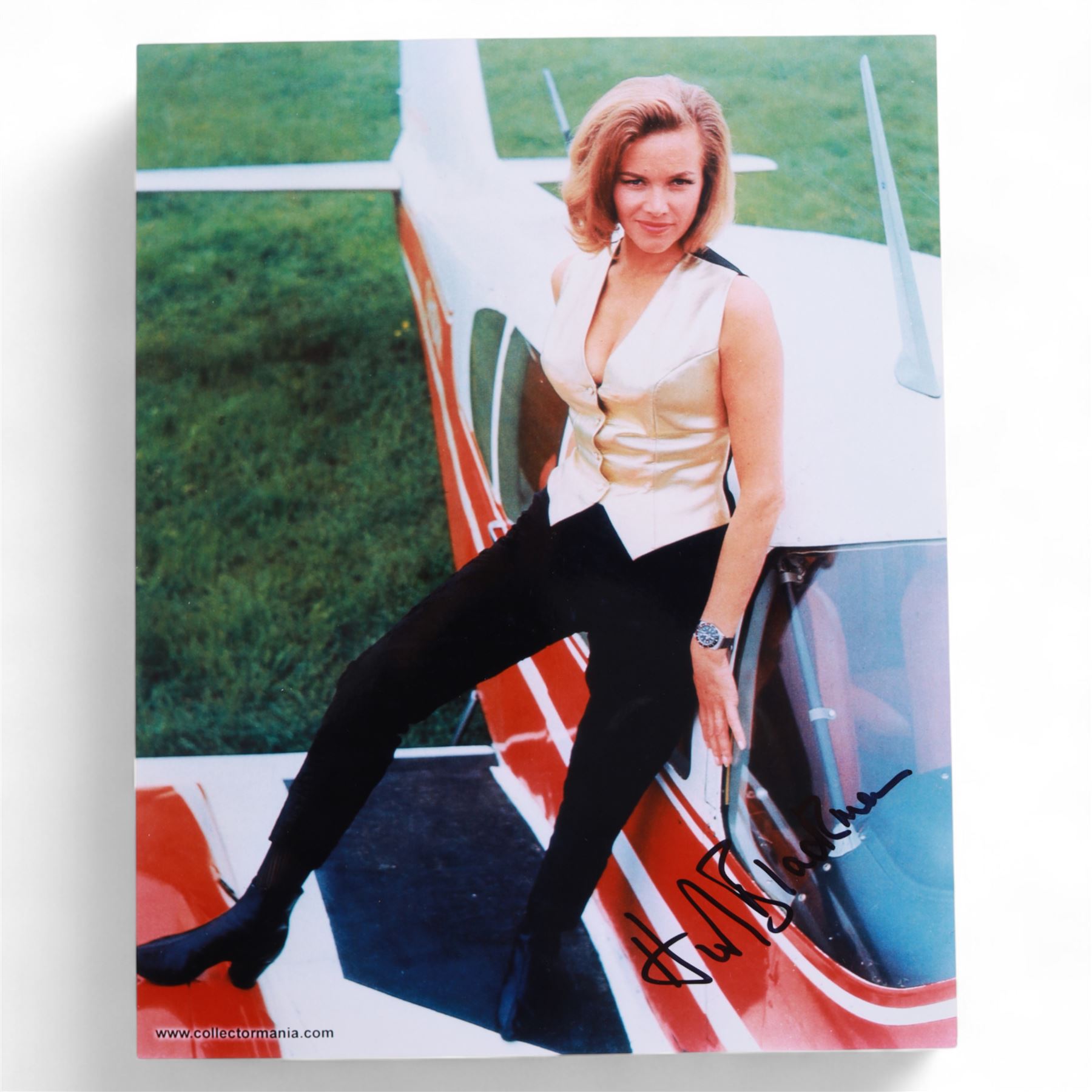 Eight James Bond signed 10 x 8