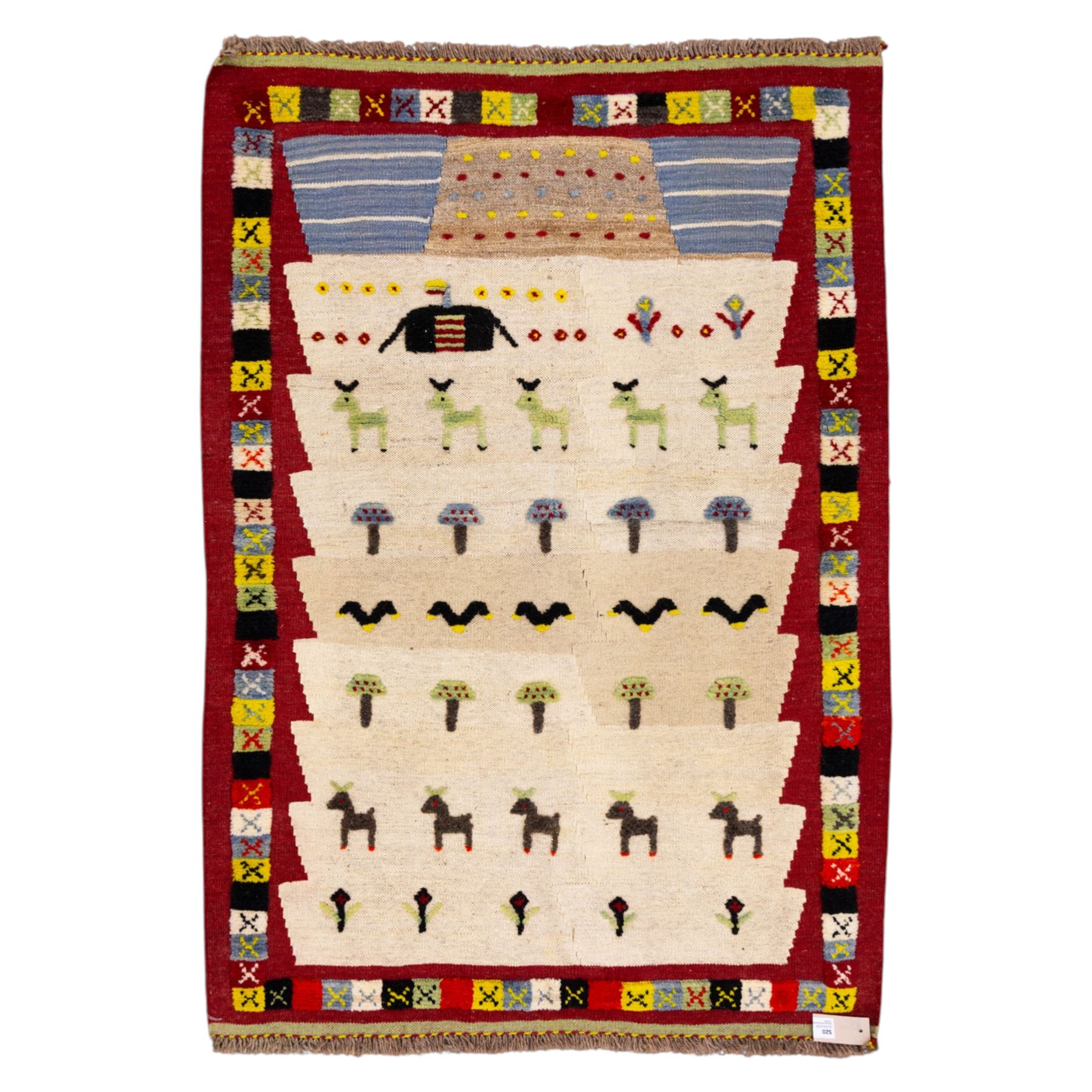 South West Persian Qashqai pictorial flatweave kilim, ivory field decorated with rows of stylized animals, bird and tree motifs applied in raised wool pile against a flat-woven ground, arranged in horizontal bands beneath a simple geometric panel enclosed by a broad red ground border with polychromed geometric devices 