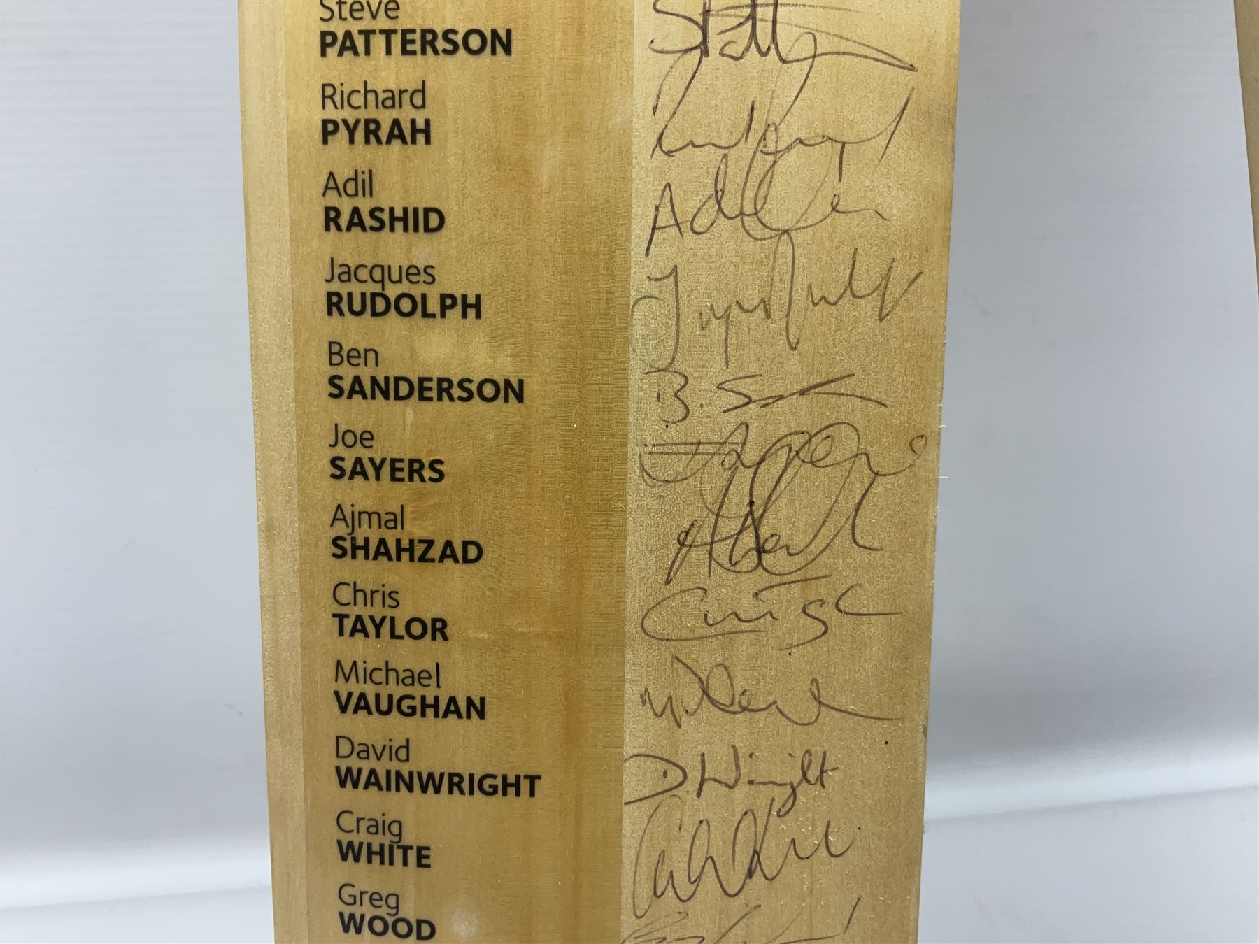 Two signed Yorkshire County cricket bats, from 2007 and 2008 seasons, bearing signatures including Darren Gough, Jason Gillespie, Younus Khan, Michael Vaughn and Tim Bresnan, etc