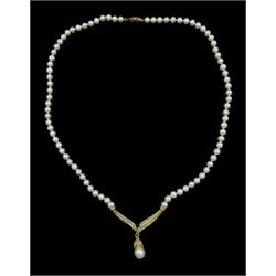 14ct gold pearl and round brilliant cut diamond necklace, suspending from a single strand cultured white pearl necklace, with gold clasp