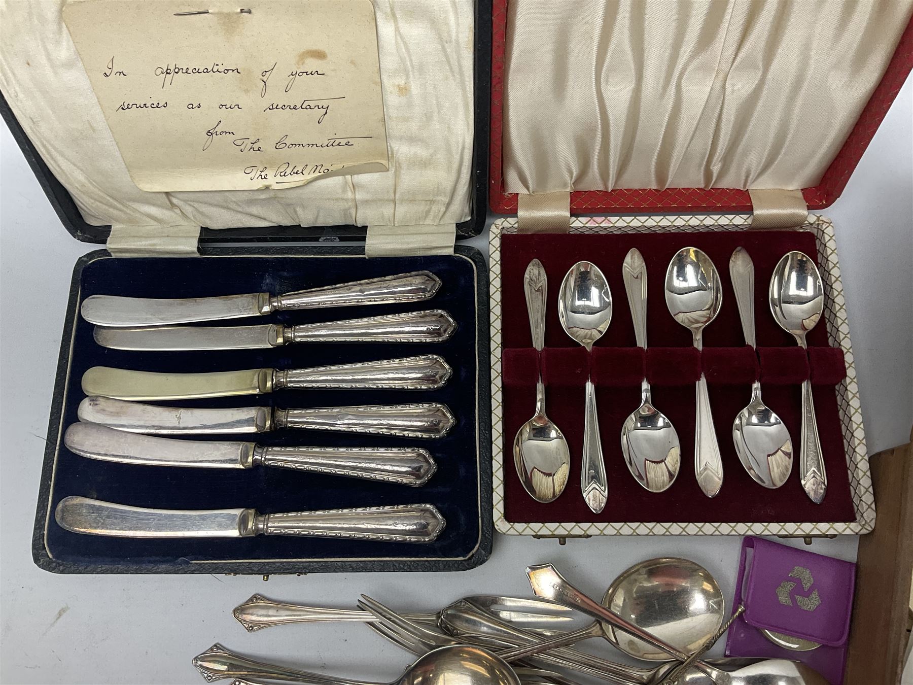 Group of silver to include cased set of six silver handled knives hallmarked Birmingham 1921 by Raeno Silver Plate Co, three hallmarked napkin rings etc together with silver plated and other metalware etc