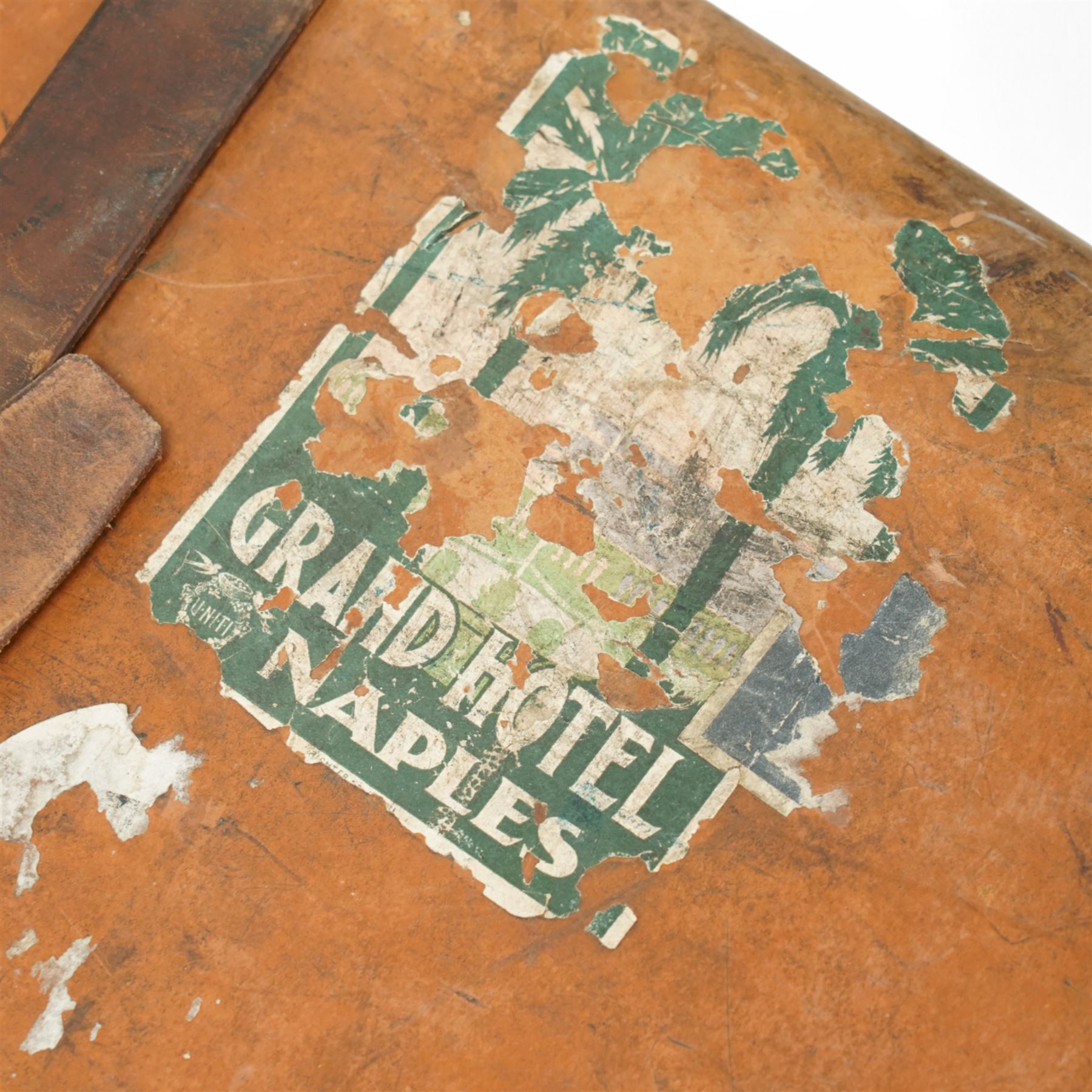 Two late 19th/early 20th century leather travelling 'Ideal' trunks, each stamped and engraved to brass locks F. Best & Co, various travel labels to include the Grand Hotel Naples, Grand Hotel Bellevue, Excelsior Palace Palermo, Waterloo etc, larger suitcase W93cm H32cm D58cm