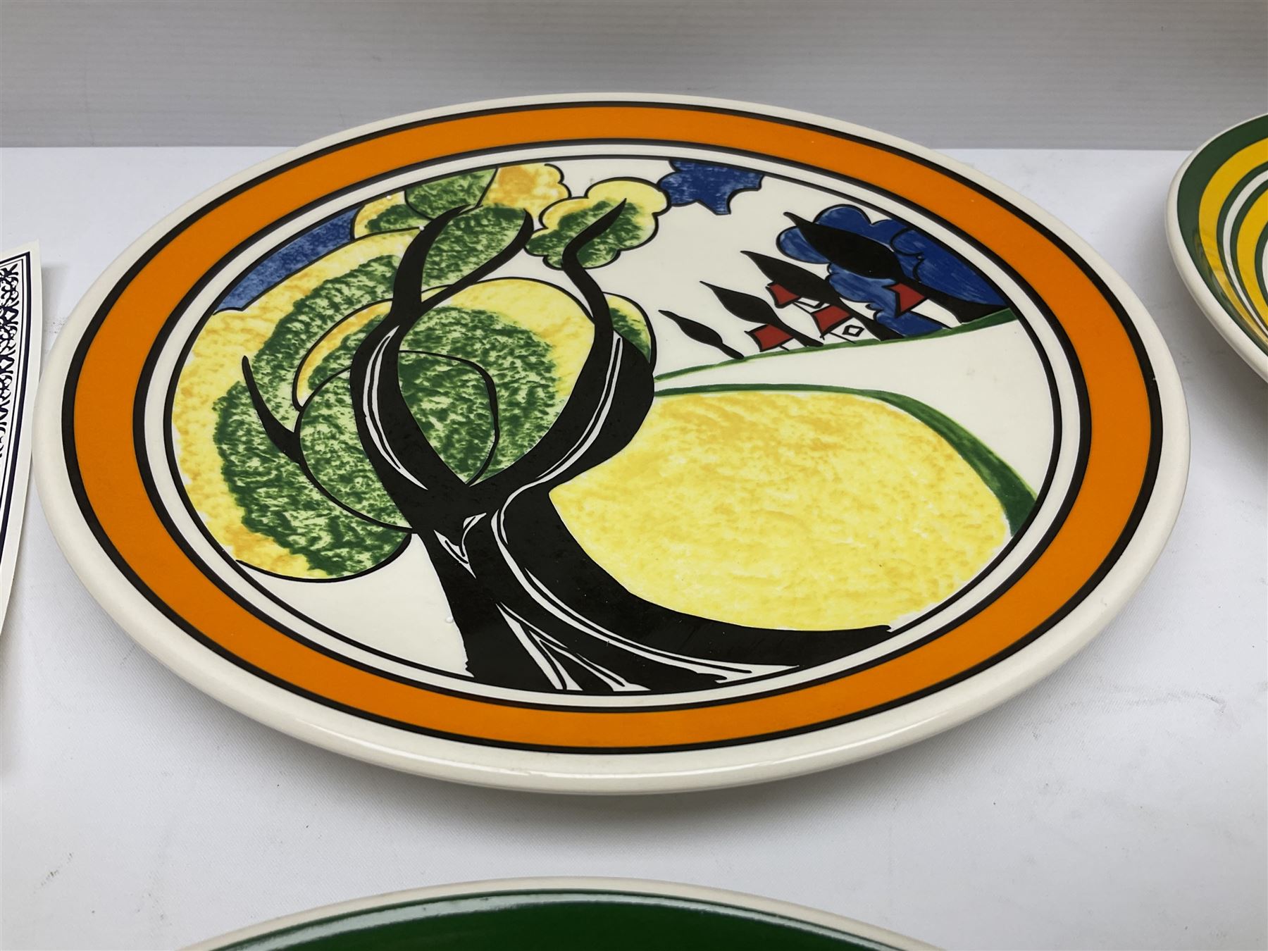 Four Clarice Cliff Wedgwood limited edition plates, comprising Orange Erin, Blue Firs, Solitude and May Avenue, all with certificate and box, D26cm