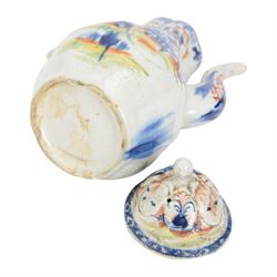 Rare mid 18th century West Pans coffee pot, circa 1764-1770, of baluster form, the moulded six lobed body decorated in underglaze blue with a chinoiserie landscape, picked out in red and green enamel, H26cm