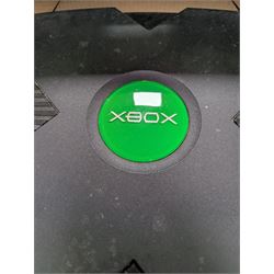 X-Box games console with two controllers, headphones and sharp shooter gun