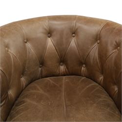 Alexander and James - pair of 'Jude' tub armchairs, traditional tub shape with buttoned back over deep seat, with studwork to the arm terminals, raised on turned front supports and splayed rear supports