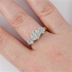 18ct gold diamond flower head cluster ring, three clusters each set with seven round brilliant cut diamonds, total diamond weight approx 0.90 carat