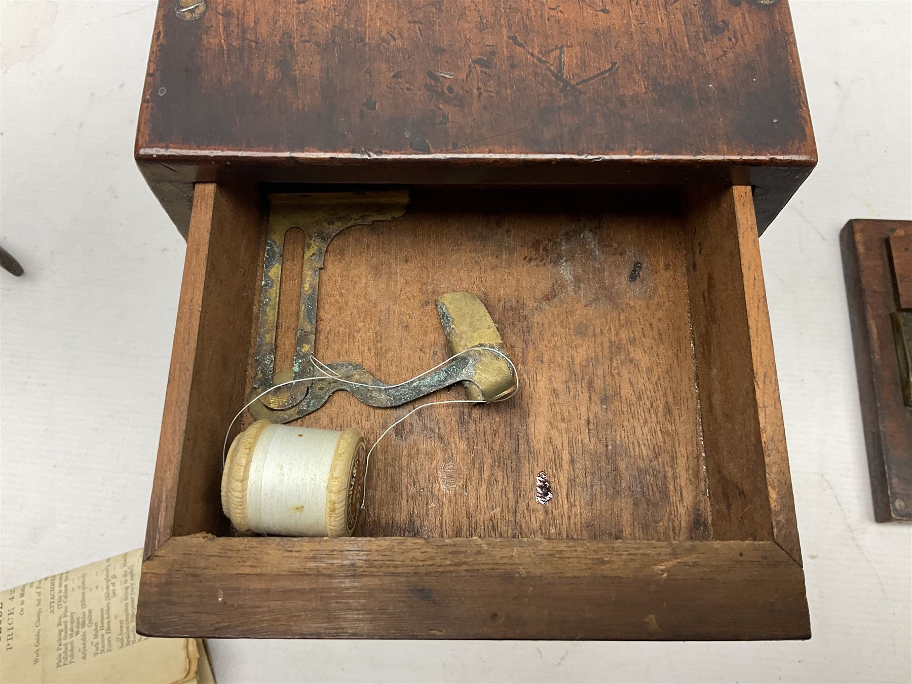 James G Weir 'The Globe' hand-cranked sewing machine, circa 1872, in black finish with gilt and flower painted decoration, the bed stamped Ja's G. Weir, 2 Carlisle Street, Soho Sq., London, with walnut locking carrying case and original manual, boxed H25cm 