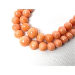 19th/early 20th century graduating double strand coral bead necklace, with rose gold clasp engraved with initials MJM