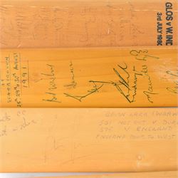 Signed International cricket memorabilia, comprising Alan Donald signed Kookaburra Commander cricket ball, wide brimmed hat signed by Darren Sammy and other West Indies players and a collection of signed miniature cricket bats, each with signatures of International cricket players including Brian Lara, Grant Flower, Richard Hadlee, Zimbabwe vs Rest of World 1993, South Africa vs Presidents VI 1994, Eastern Province South Africa 1992 and South Africa Touring Side Scarborough 1994