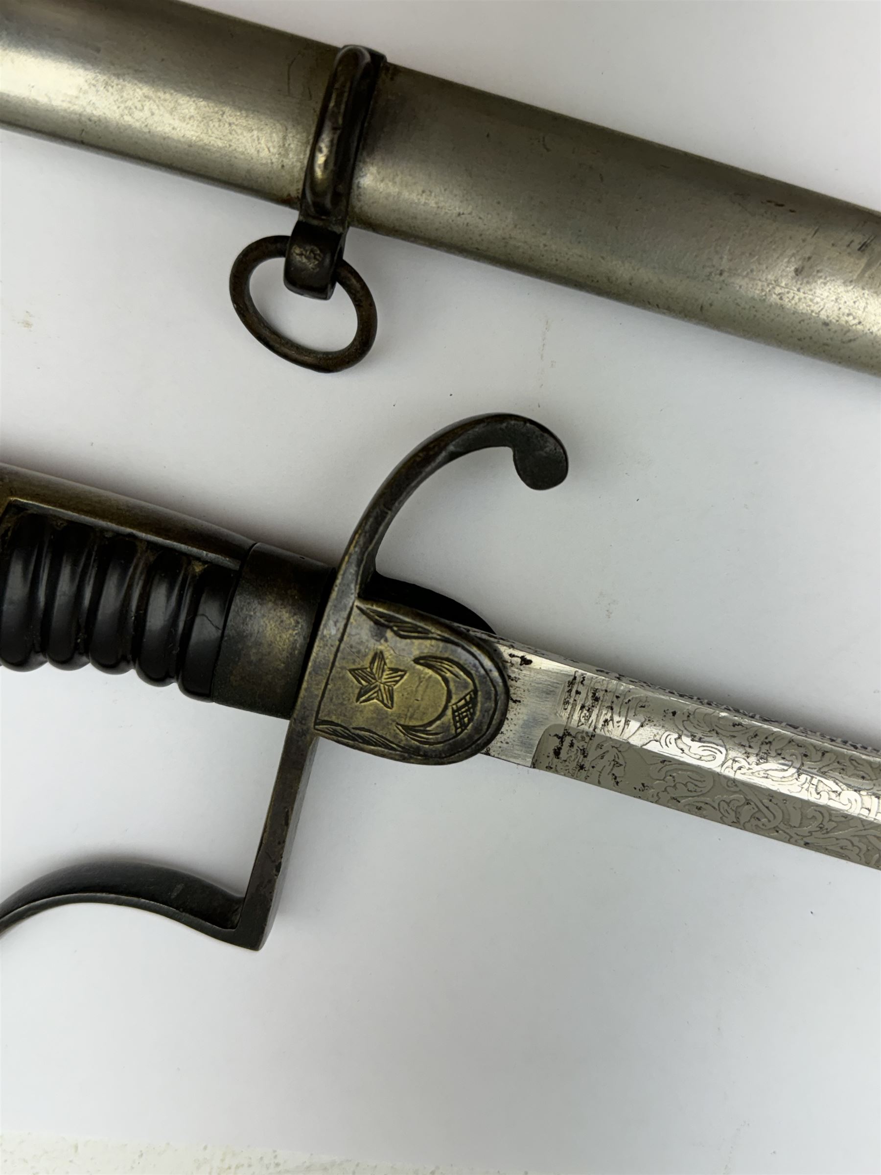 Ottoman/Turkish WW1 Period Infantry Officer's Short Sword,  the single edge fullered steel blade etched with a martial trophy, star and crescent, L73cm, the rib etched Vahram Tagirian, with steel scabbard, L87cm