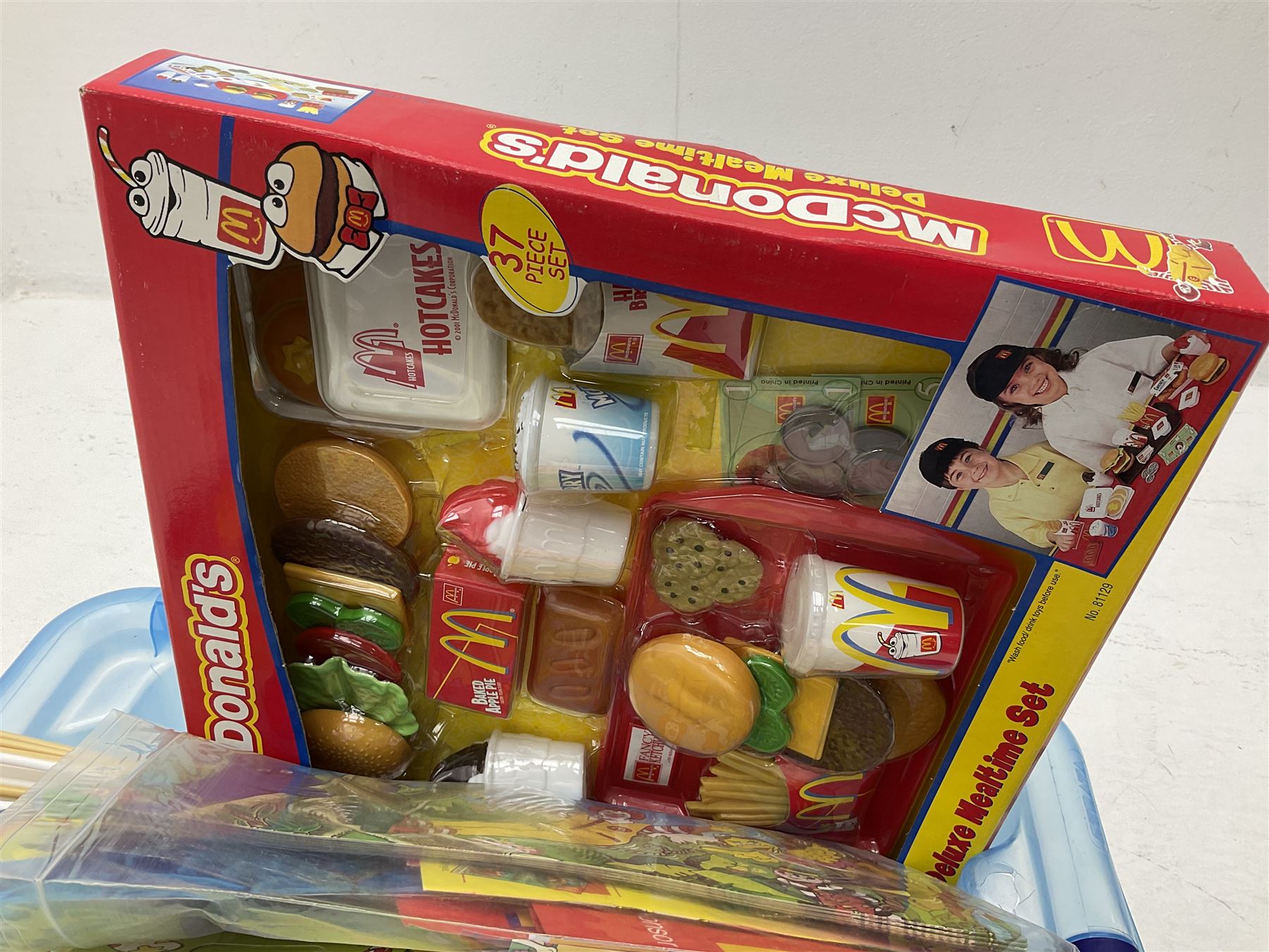 Large quantity of Mcdonalds toys in three boxes