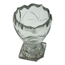 Five 19th century penny lick glasses, together with a pair of 19th century cut glass open salts with lemon squeezer bases, and a 19th century glass measure, largest example H12cm