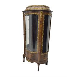Early 20th century French kingwood vitrine or display cabinet, decorated with applied foliate cast band, serpentine glazed door and sides, inlaid with marquetry decoration of floral bouquets and branches, cartouche mounts to the apron, raised on cabriole supports
