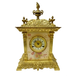  Victorian brass and cast gilt metal mantle clock, architectural case with urn finials and Crown Devon panels, dial with cream Arabic chapter, twin train British United Clock Co. movement striking the half hours on a coil, H48cm, W31cm, D18cm  