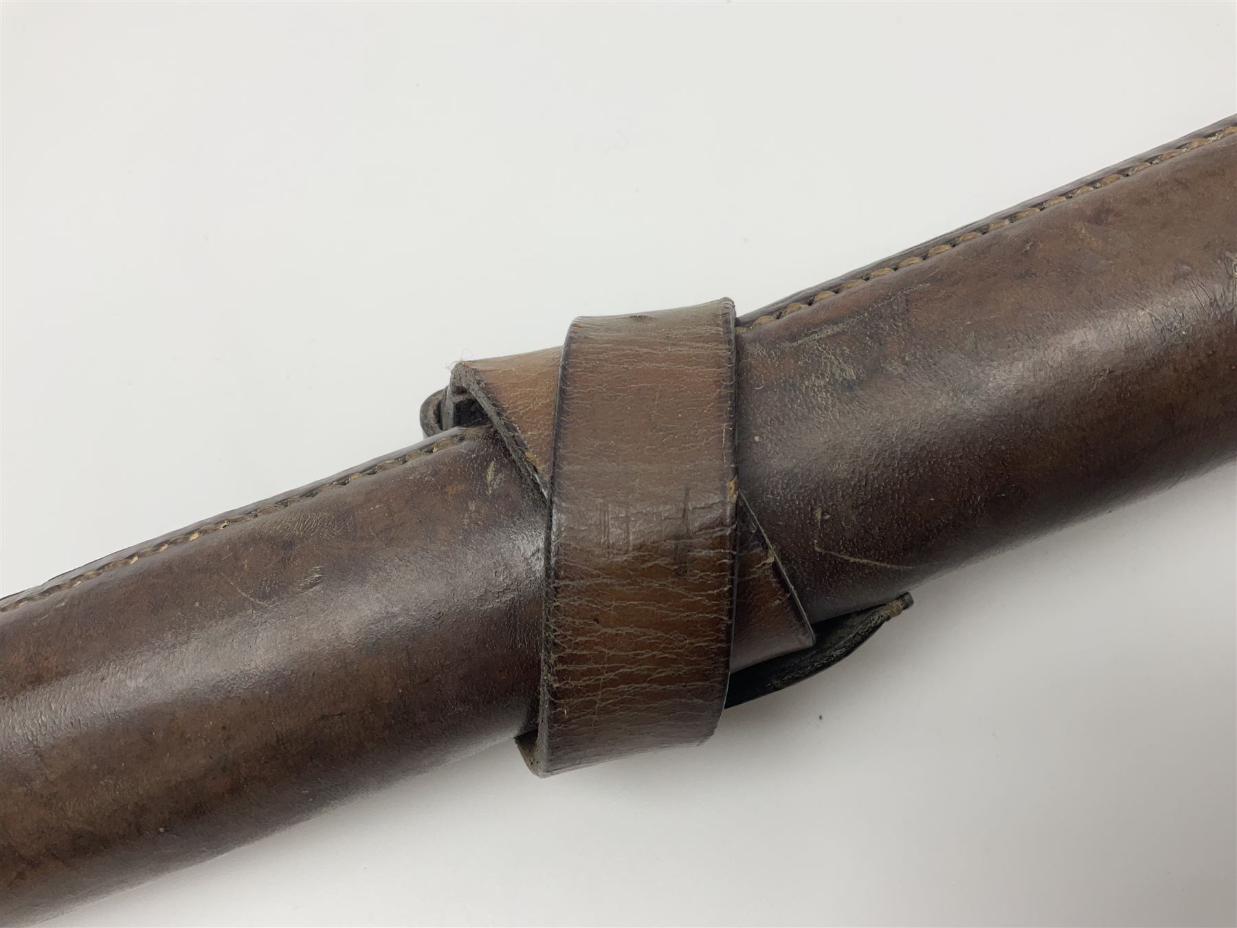 19th century telescopic hunting horn, the bell engraved 'The Beaufort', with makers mark Kohler & Son, makers, 61 Victoria Street, Westminster (from Covent garden) London, in a leather sheath, horn full extended L91cm 