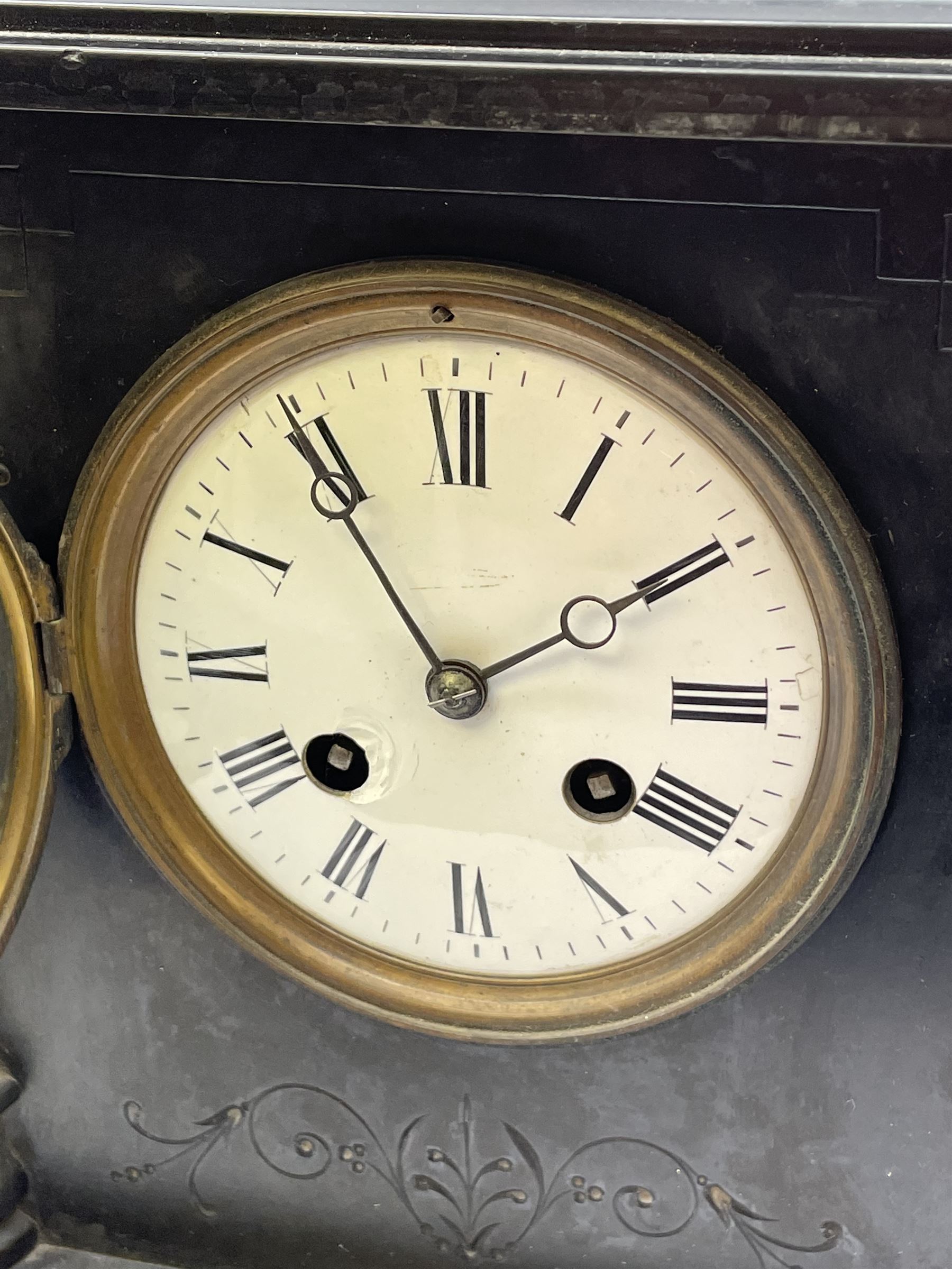 Victorian black slate and marble mantel clock, circular Roman dial enclosed by two marble pilasters, decorative engraving, twin train movement striking the hours and half on coil