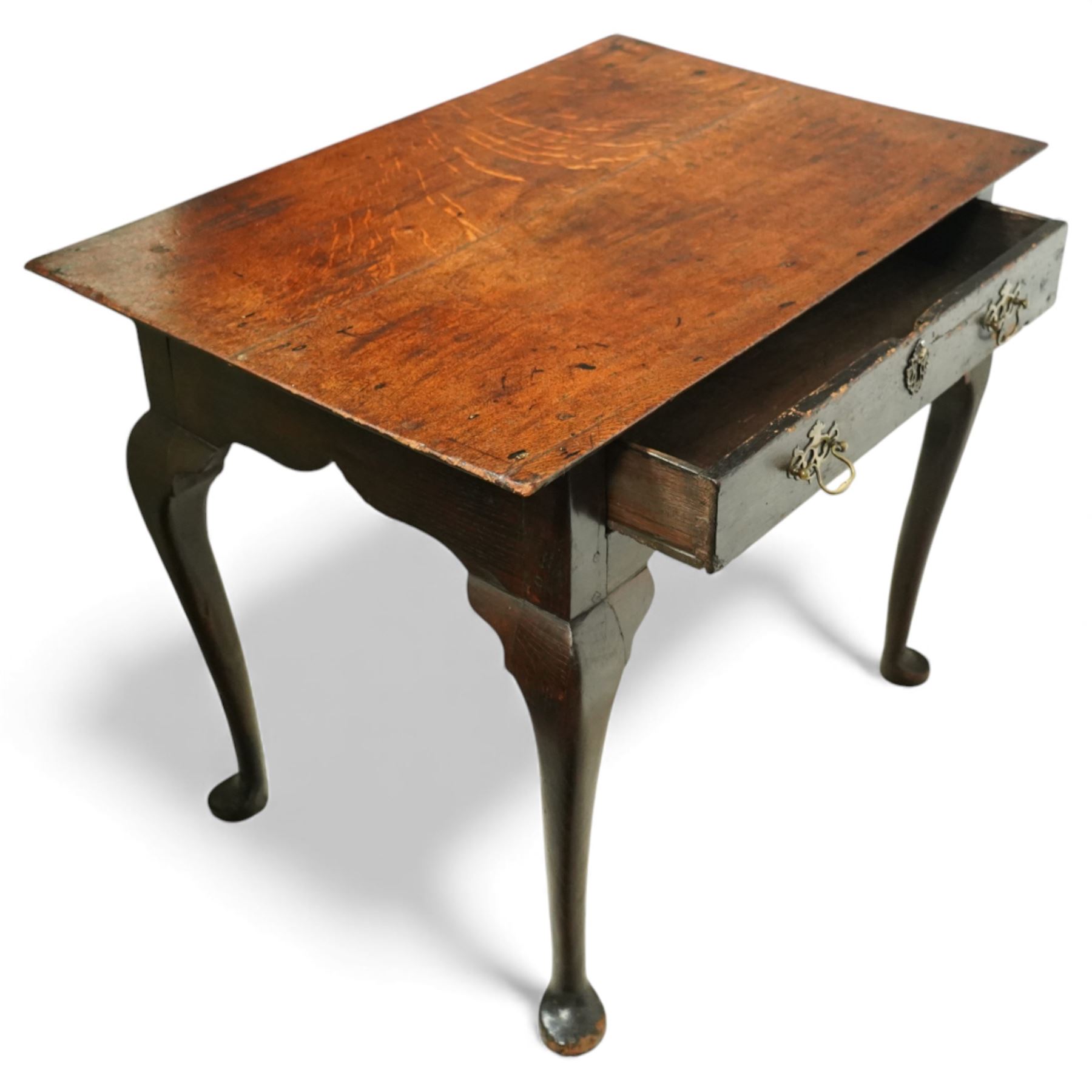 Early 18th century Georgian oak single drawer side table, the rectangular top over a single frieze drawer with pierced brass escutcheon and handles, shaped apron, raised on cabriole legs with pad feet