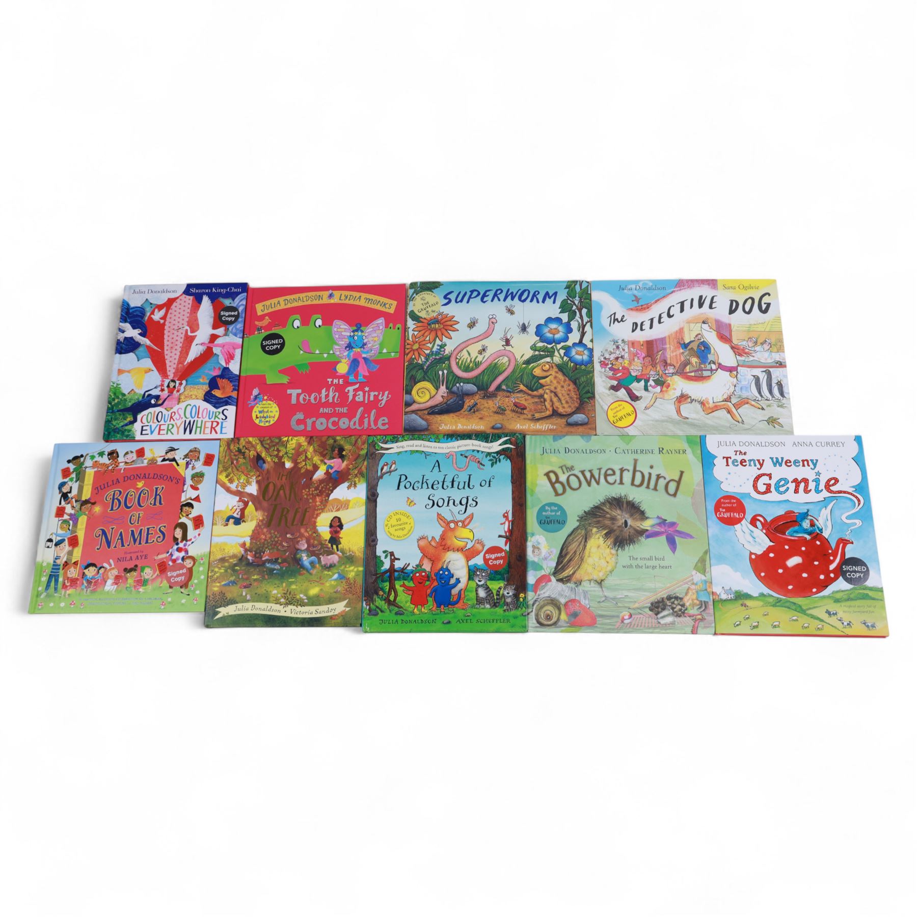 Nine signed first edition Julia Donaldson children's books, comprising The Bowerbird, The Detective Dog, Colours Colours Everywhere, Superworm, The Tooth Fairy and The Crocodile, Teeny Weeny Genie, A Pocketful of Songs, Book of Names and The Oak Tree