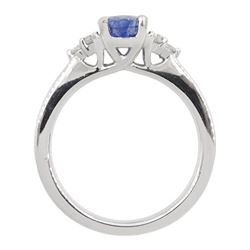 Platinum oval sapphire ring, each side set with three round brilliant cut diamonds, hallmarked, sapphire approx 0.90 carat