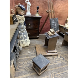 Late Victorian wooden school room setting with bisque head teacher and six German all bisque pupils each seated at a combined desk and chair with slate board, in a classroom furnished with chest of drawers, fire-surround, lectern, wall map, pictures, miniature books, school bell, chalk board on easel, wall clock etc, L70cm H28cm D28cm
