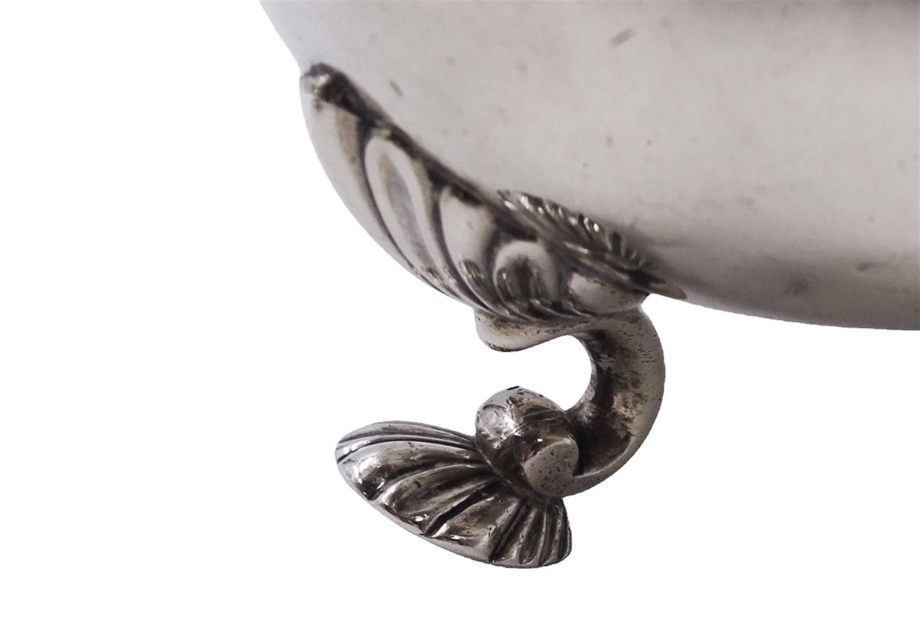 Pair of George III silver sauce boats, each of typical form with gadrooned rim, and acanthus capped scroll handle, upon three shell mounted shell pad feet, hallmarked George Methuen, London 1760 including handle H13cm, approximate total weight 30.25 ozt (941 grams)