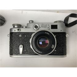 Seven SLR cameras, including Pentacon FB, serial no 163607, with Carl Zeiss Jena Tessar 2.5/50 lens, serial no 5750935, a Zorki 4K serial no 76905895, with Jupiter 8 2/50 lens and a Minolta SR-7 serial no 2175093 etc