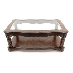Kevin Charles American walnut rectangular serpentine coffee table , inset glass top, carved column supports joined by undertier 