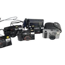 Collection of cameras including two Minolta AF-E, Pentax Zoom 90, Samsung AF 200, Pentax Espio 120Mi, Yashica Microtec Zoom 70, Canon Sure Shot and Minolta Riva Zoom 140 EX