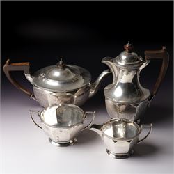  Silver tea set comprising teapot, hot water jug, sugar bowl and milk jug of circular pane...