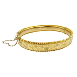 9ct gold bangle engraved decoration, Sheffield 1977, approx 17.42 gm
