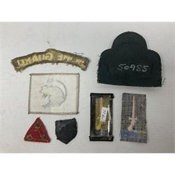 Royal Arms cloth arm adge as worn by Regimental Serjeant-Majors in Foot Guards; naval cap badge; WW2 Commando/Special Forces cloth badges; Home Guard and LDV shoulder titles; and other cloth badges including armoured division, 45th and 77th division, 52nd Lowland Mountain division etc; and 24th Infantry Brigade airmobile pennant