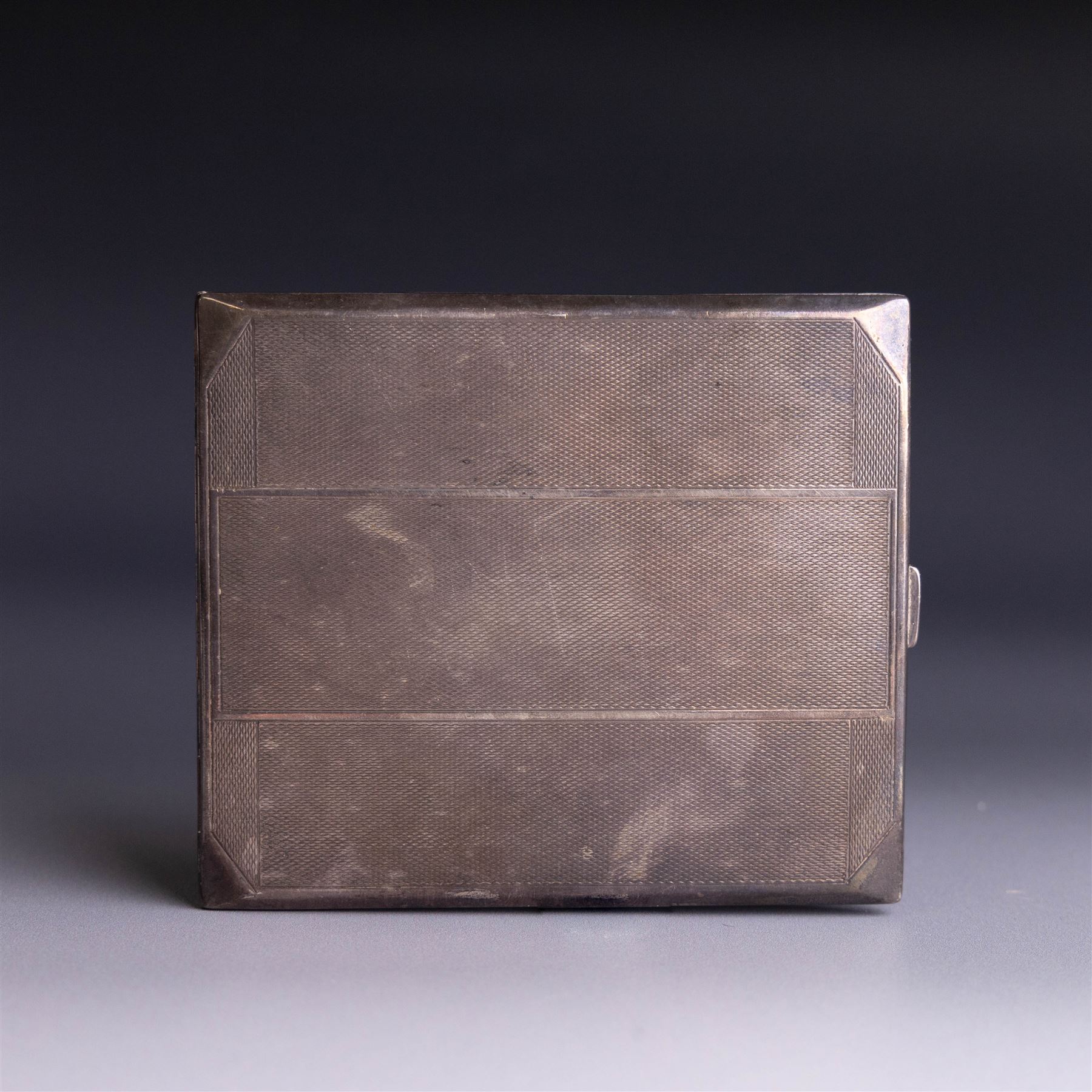 1940s silver cigarette case, of rectangular form with engine turned decoration, hallmarked Ellis & Co, Birmingham 1940, H8.5cm, W10cm