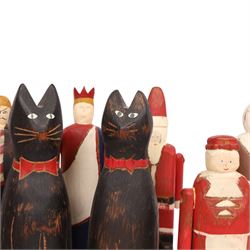 American Folk art figures, by Wolf Creek, comprising two cats, Father Christmas, Mrs Clause, Pirate and three others, with stamps and signatures beneath     