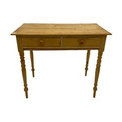 19th century pine side table, two drawers over slide, on turned supports