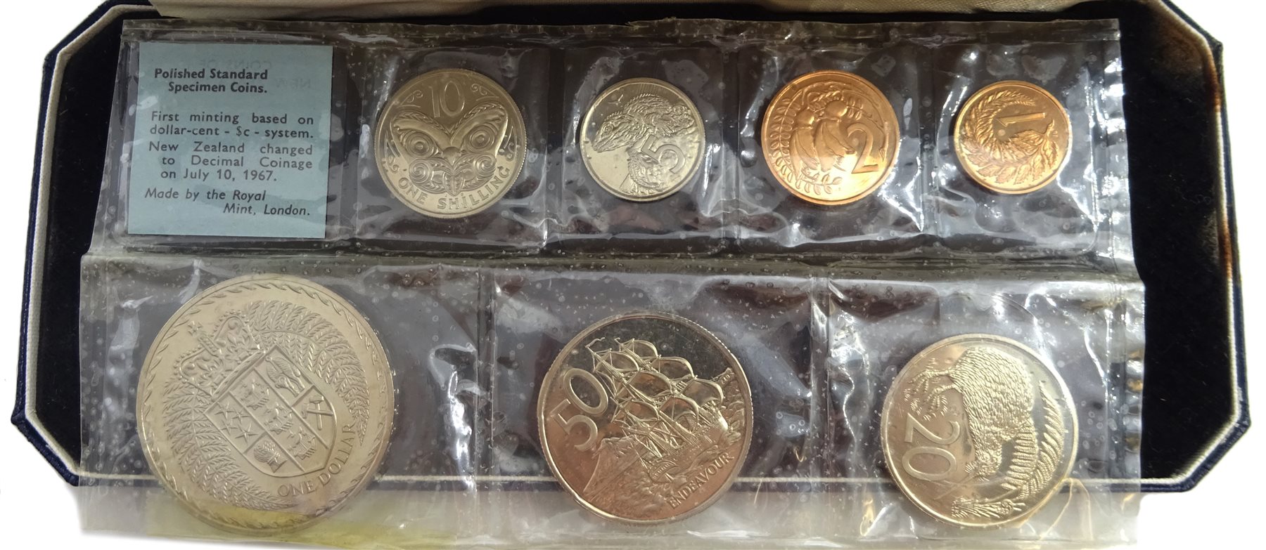  Bailiwick of Jersey 1957 cased four coin set and 1964 cased four coin set, Guernsey 1966 cased four coin set and New Zealand 1967 decimal coins cased seven coin set with coins still sealed in plastic packaging (4)   