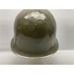 1950s French Algerian War steel helmet with liner; indistinctly marked 'S.I.A. LE EANS(?) 71R'
